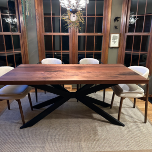 black walnut table with black steel intersecting x base Southpaw Furniture Co